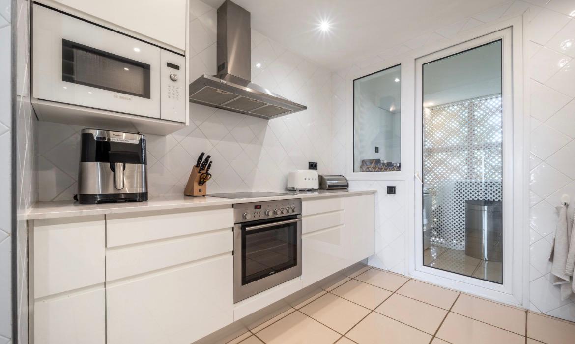 Fully equipped open kitchen, wide view