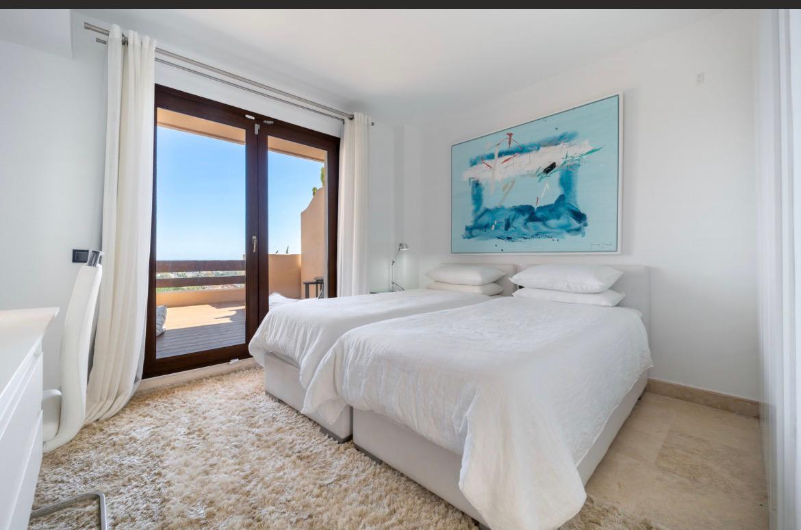 Twin bedroom with sea-view terrace